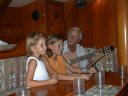 Grandpa and the girls singing, 02/00